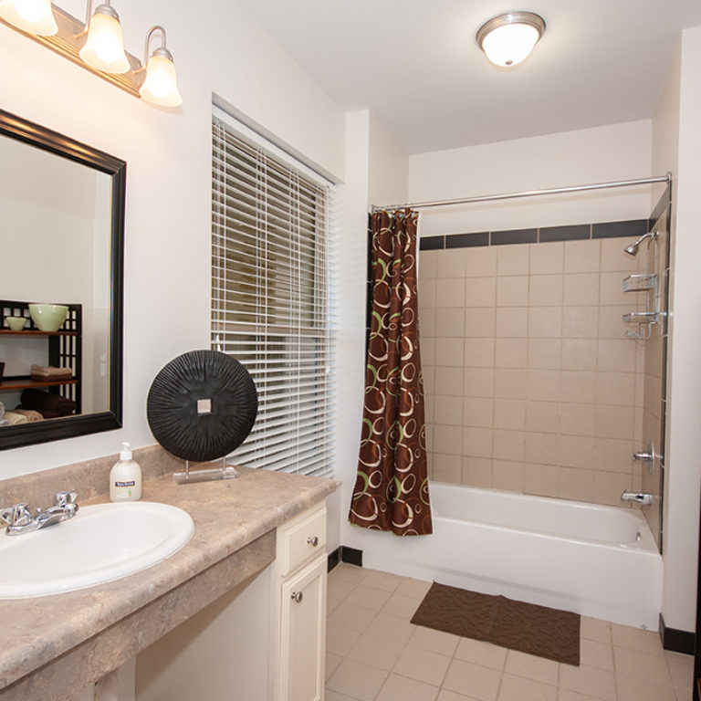 Interior bathroom at Columbia Blackshear Senior Residences - Senior Apartments in Atlanta, GA