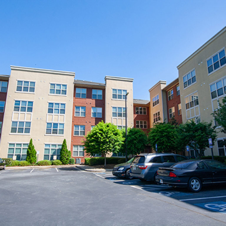 Parking area at Columbia Blackshear Senior Residences - Senior Apartments in Atlanta, GA