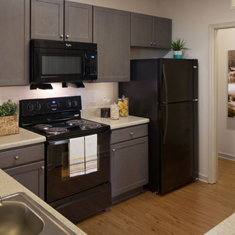 Kitchen interior at Columbia Brookside Classic - Apartments in Athens, GA