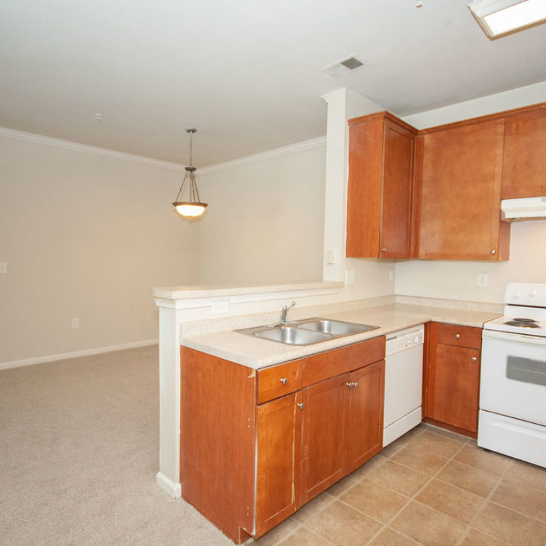 Apartment kitchen and dining room view at Columbia Commons - Apartments in Atlanta, GA