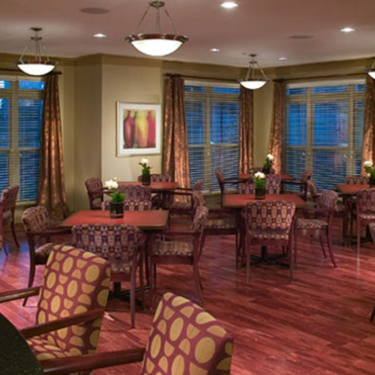 Community room at Columbia Senior Residences at MLK Village with lake - Senior Apartments in Atlanta, GA