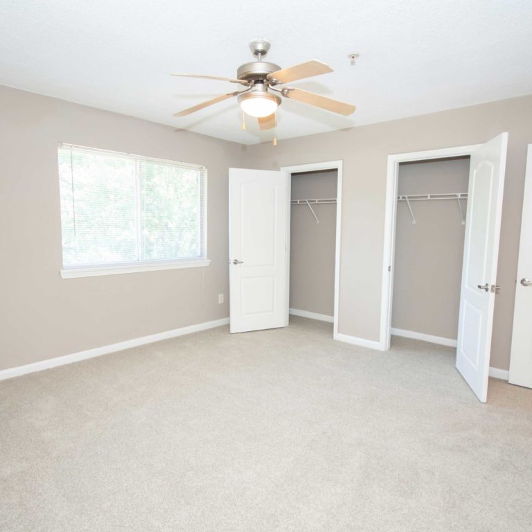 Interior bedroom with spacious closets at Park Commons Apartments Community - Senior Apartments in Atlanta, GA