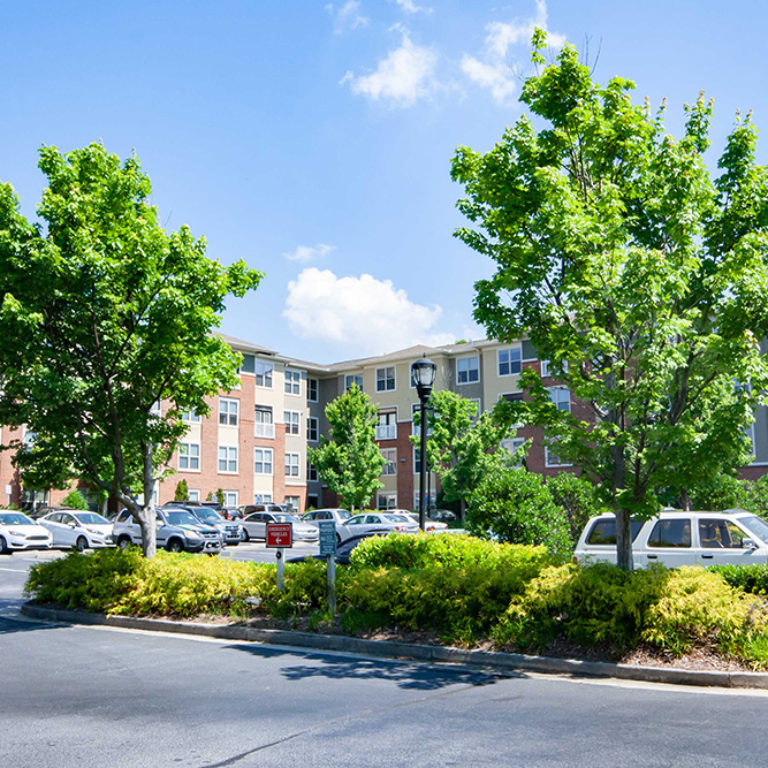 Parking lot at Columbia Heritage Senior Residences - Apartments in Atlanta, GA