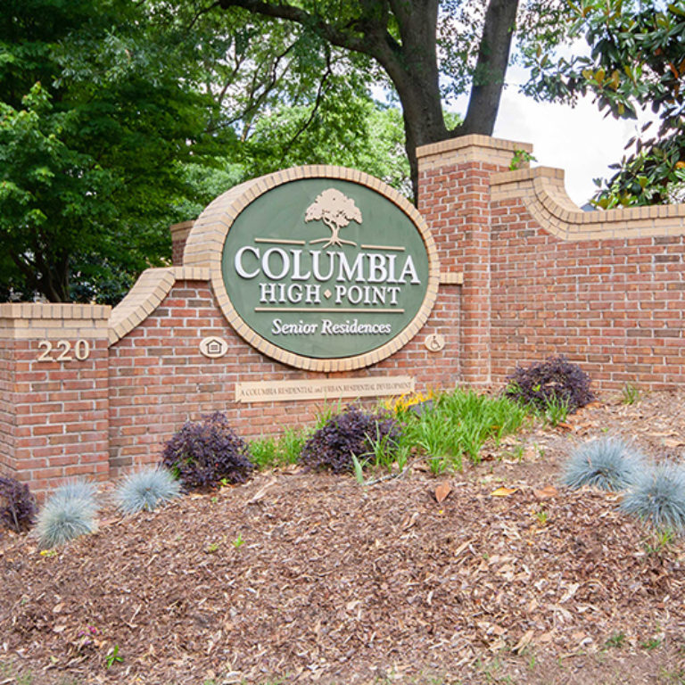 Community signage at Columbia High Point Senior Residences - Apartments in Atlanta, GA