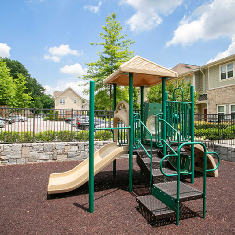 Playground at The Retreat at Edgewood Townhomes - Apartments in Atlanta, GA