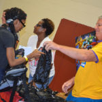 Jim Grauley -Chief Operating Officer- Handing out school Supplies - Columbia Residential