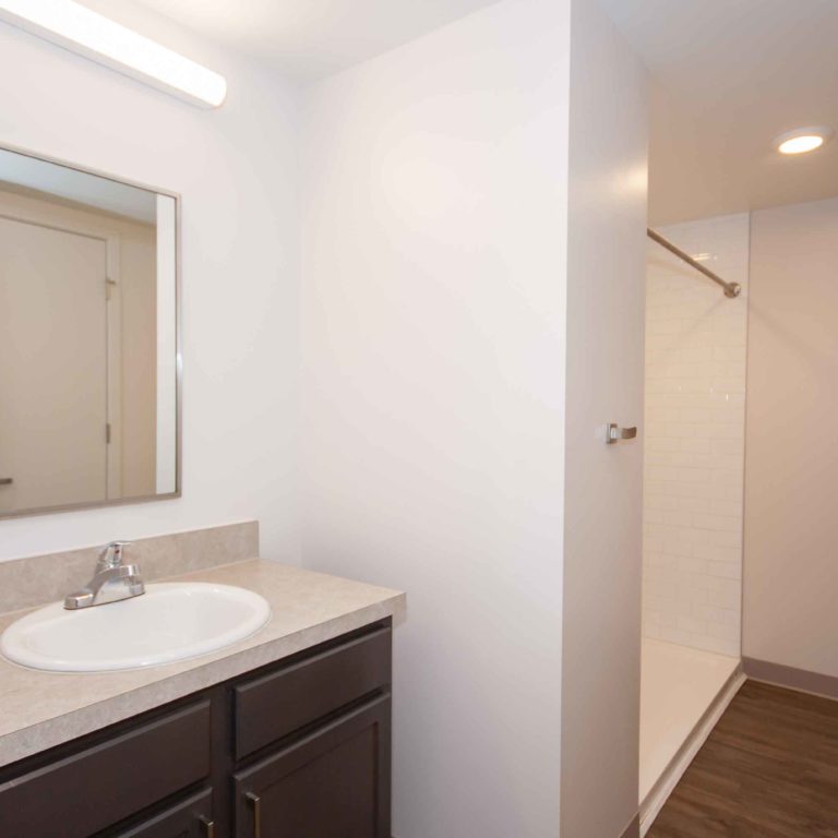 Residence bathroom at 10th and Juniper - Apartments in West Midtown Atlanta, GA