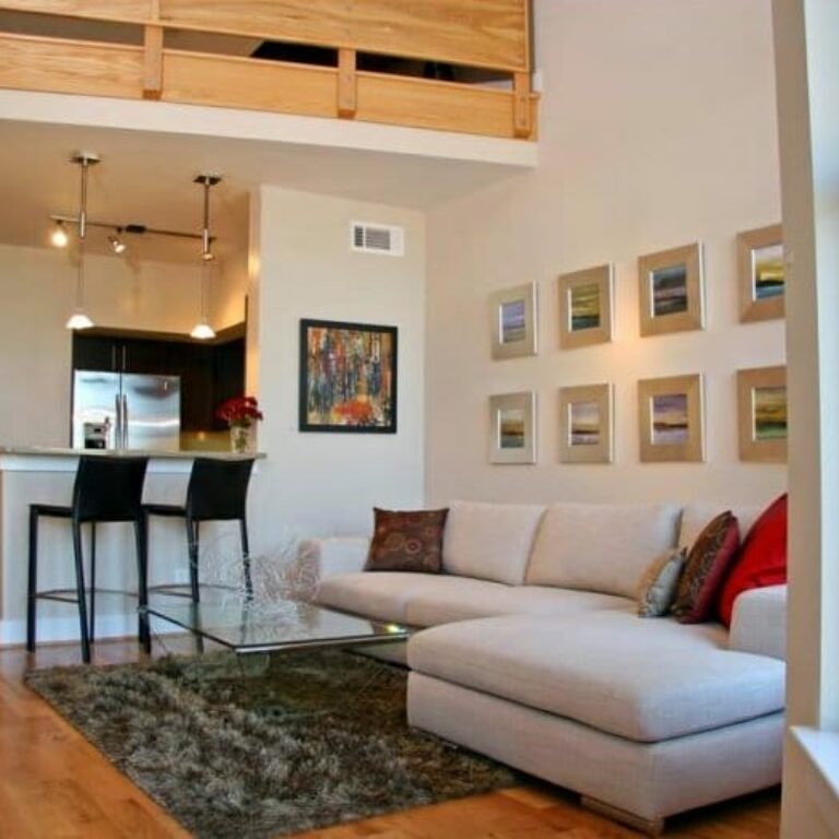 Photo of living room and kitchen Artist Square Apartments in Atlanta GA