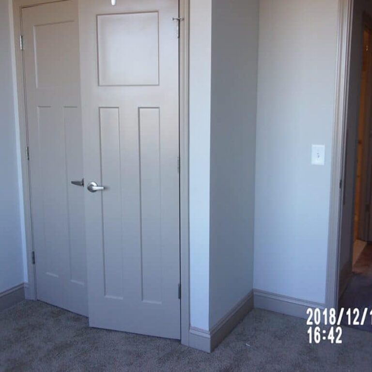 closet door inside of a bedroom at Maggie Russell Tower apartments in Atlanta GA