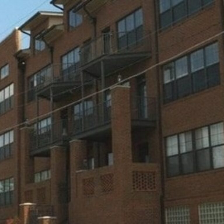 balconies on a brick apartment building in atlanta georgia