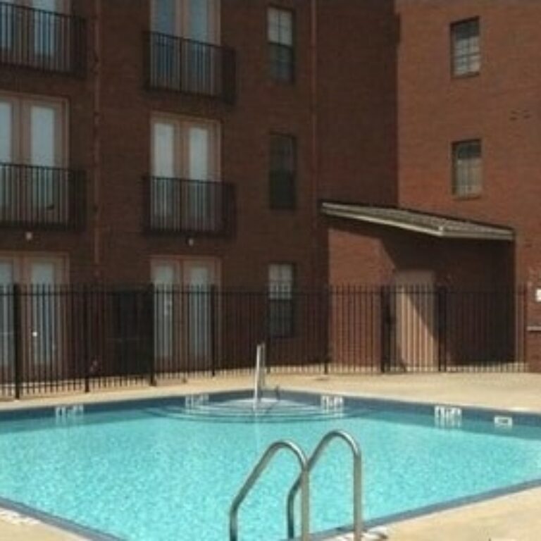 outdoor pool surrounded by building Stonewall Lofts in Atlanta GA