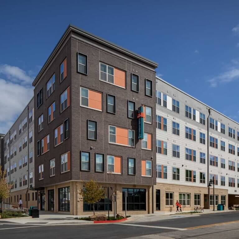 sunny daytime view of the exterior of The Link at Columbia Senior Residences in Decatur Georgia