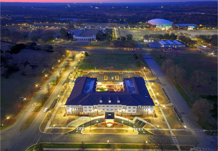 Aerial view of Miles Crossing Senior Residences and surrounding area at night in Columbus, GA